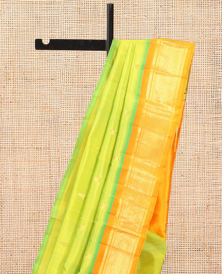 Green Kanchipuram Silk Saree, Graced with Zari Buttas, Complemented by a Contrast Border of Thilakam Mokku, and Jaal Design, Zari Design Pallu, and No Blouse