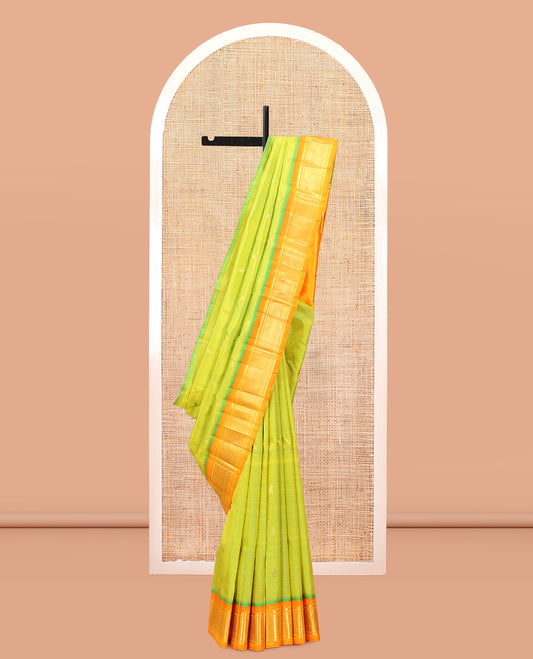 Green Kanchipuram Silk Saree, Graced with Zari Buttas, Complemented by a Contrast Border of Thilakam Mokku, and Jaal Design, Zari Design Pallu, and No Blouse