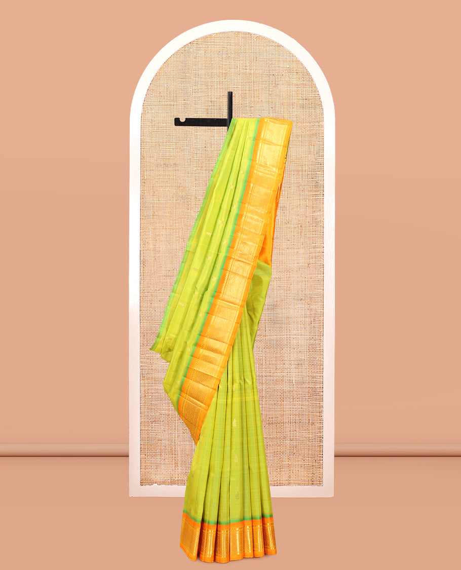 Green Kanchipuram Silk Saree, Graced with Zari Buttas, Complemented by a Contrast Border of Thilakam Mokku, and Jaal Design, Zari Design Pallu, and No Blouse