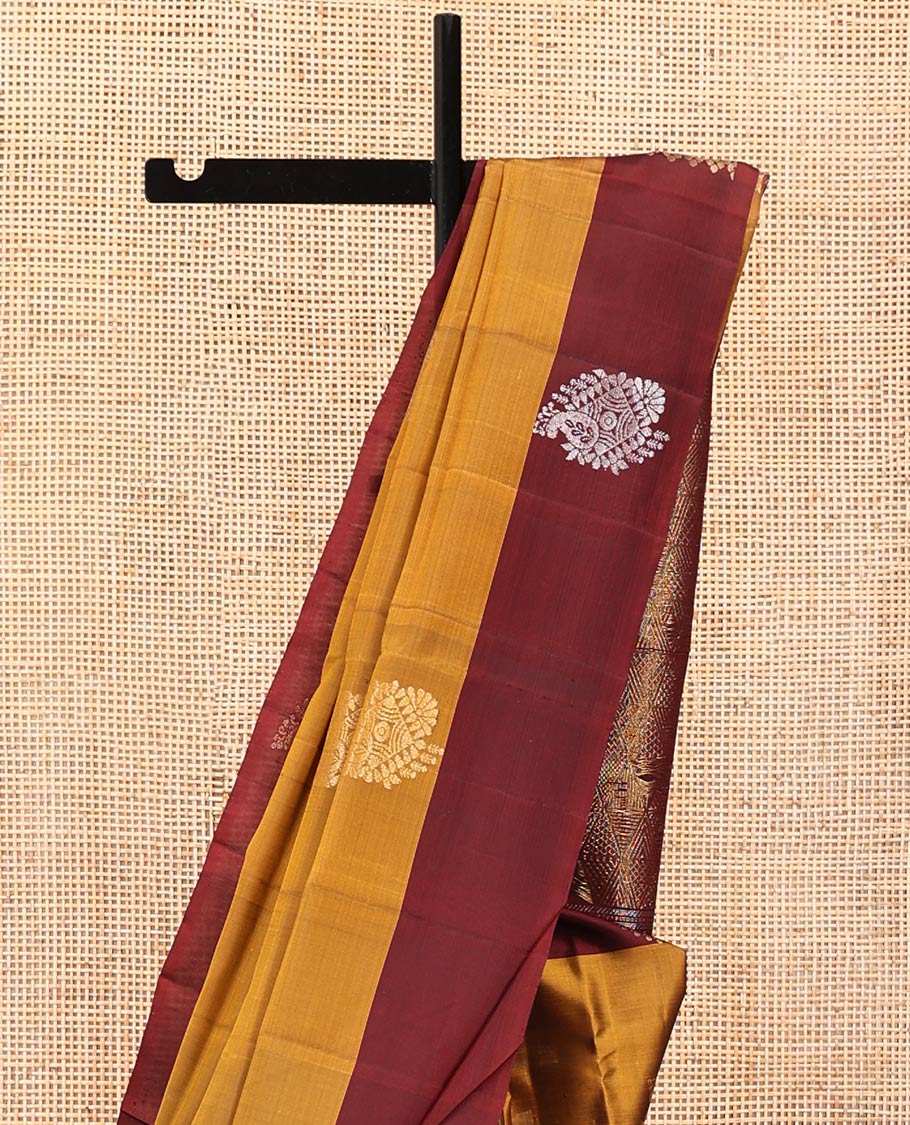 Yellow Mayuri Lite Silk Mix Saree, Adorned with Zari Buttas on Its Body, Complemented by a Contrast Border of Unique Designs, Geometric Patterns Pallu, and Paired with a Contrast Blouse
