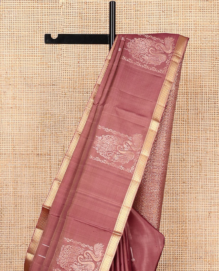 Pink mayil buttas soft silk saree, zari piping border, and pallu of intricate designs