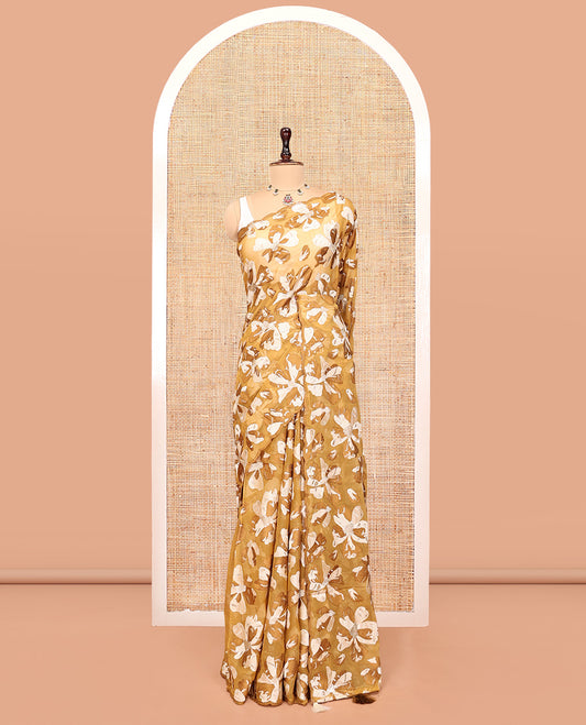 Brown Organza Saree, Steeped in the Prettiness of Floral Thread Embroidery, a Scalloped Border, and a Matching Blouse