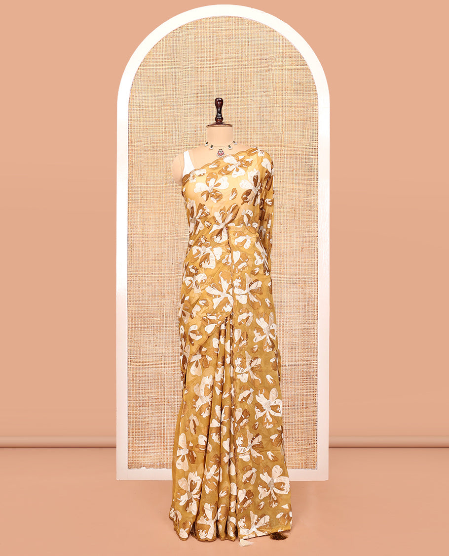 Brown Organza Saree, Steeped in the Prettiness of Floral Thread Embroidery, a Scalloped Border, and a Matching Blouse