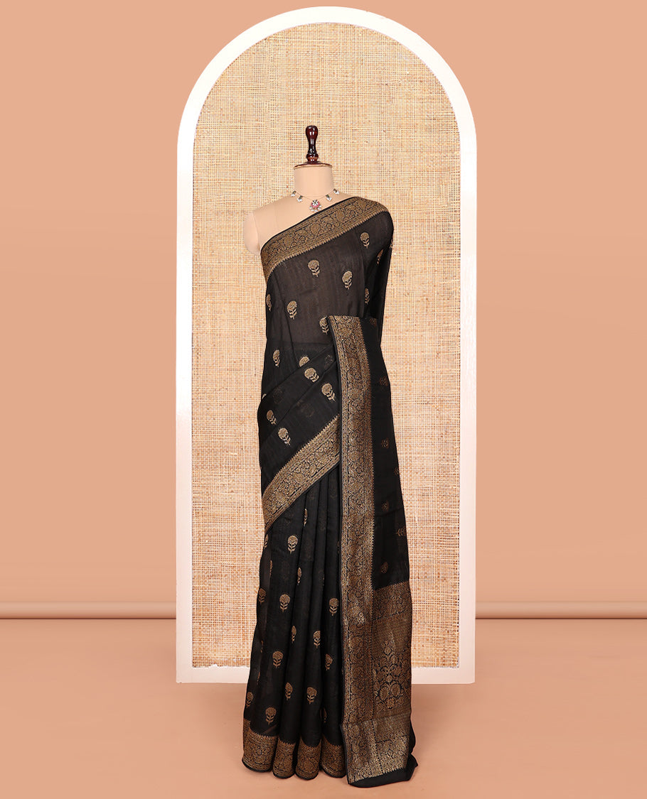 Black Matka Silk Saree, Mesmerized with Floral Buttas on Its Body, Highlighted by a Floral and Paisley Design Border, Pallu of Floral Designs, and Paired with a Matching Blouse