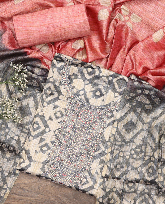 Grey material chudidar set, batik style printed with neck embroidered top, contrast plain bottom, and batik printed dupatta