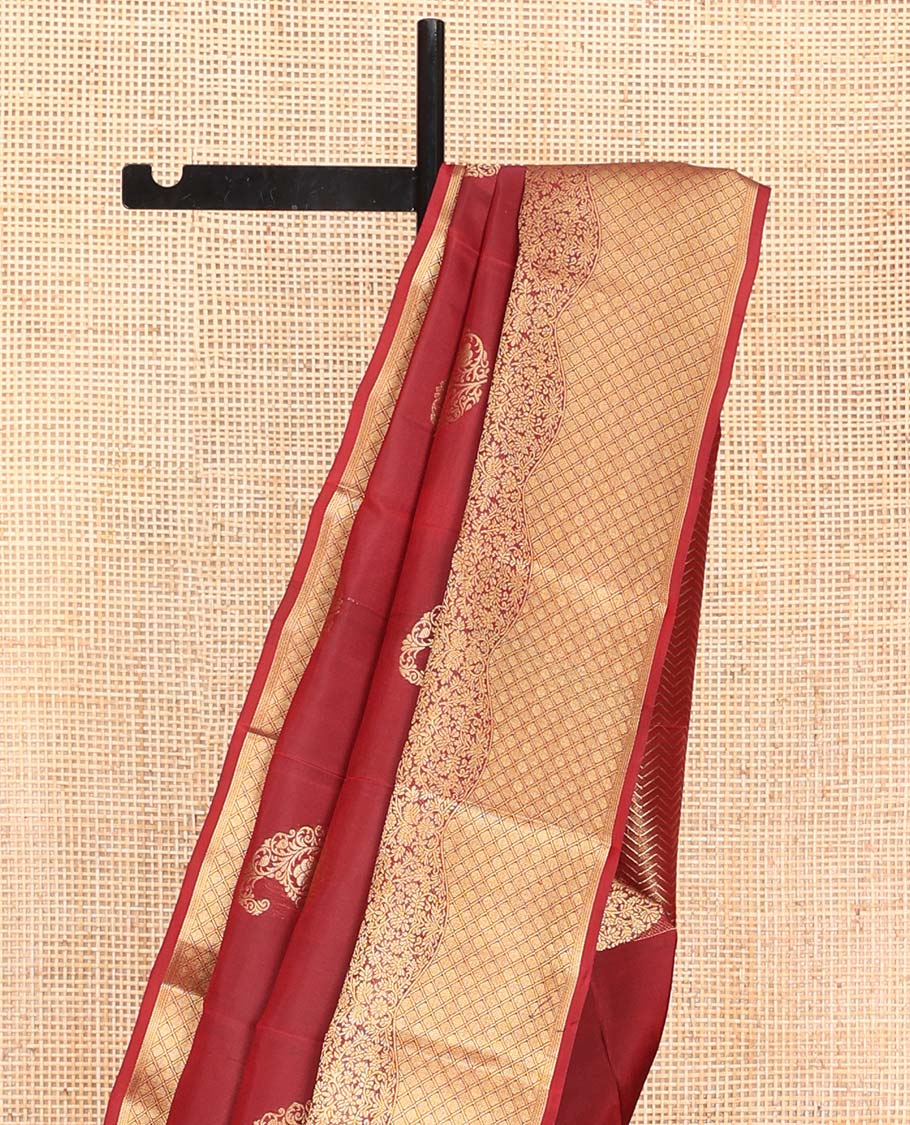 Red Vasundhara Lite Silk Mix Saree, Detailed with Zari Buttas All Over Its Body, Highlighted by a Zari Border of Floral and Jaal Designs, Pallu Steeped with Chevron Stripes, and Paired with a Matching Blouse