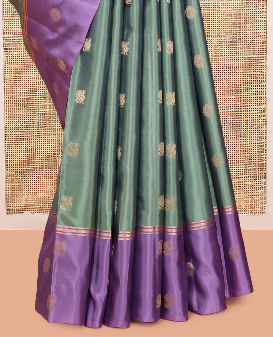 Green Vasundhara Lite Silk Mix Saree, Adorned with Mayil-Chakram Buttas, a Contrast Mayil-Chakram Zari Border, Grand Pallu, and a Contrast Blouse