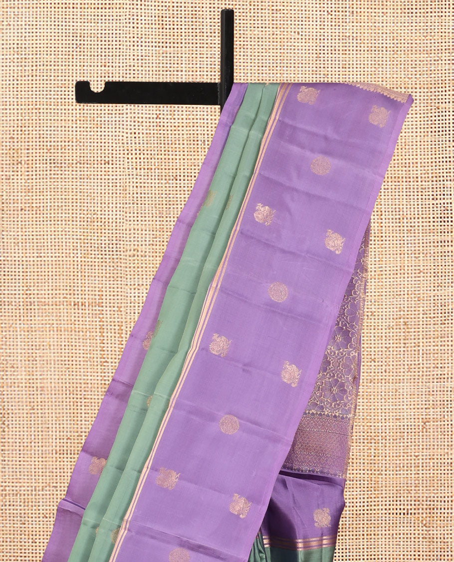 Green Vasundhara Lite Silk Mix Saree, Adorned with Mayil-Chakram Buttas, a Contrast Mayil-Chakram Zari Border, Grand Pallu, and a Contrast Blouse