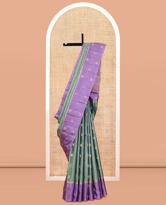 Green Vasundhara Lite Silk Mix Saree, Adorned with Mayil-Chakram Buttas, a Contrast Mayil-Chakram Zari Border, Grand Pallu, and a Contrast Blouse