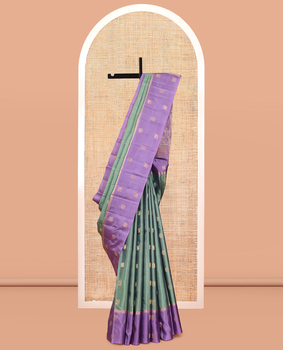Green Vasundhara Lite Silk Mix Saree, Adorned with Mayil-Chakram Buttas, a Contrast Mayil-Chakram Zari Border, Grand Pallu, and a Contrast Blouse