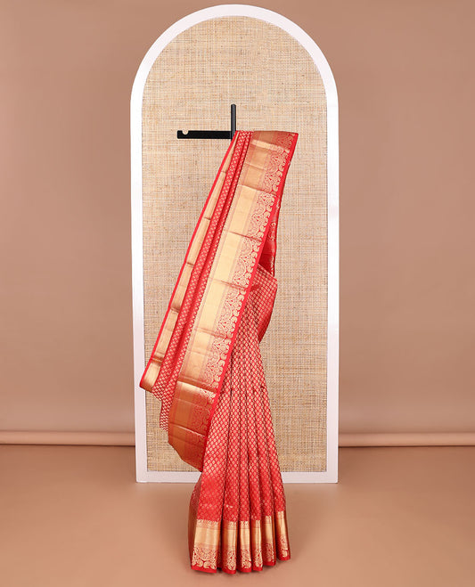 Red jacquard kancheepuram silk saree with self border of intricate zari design & floral design pallu