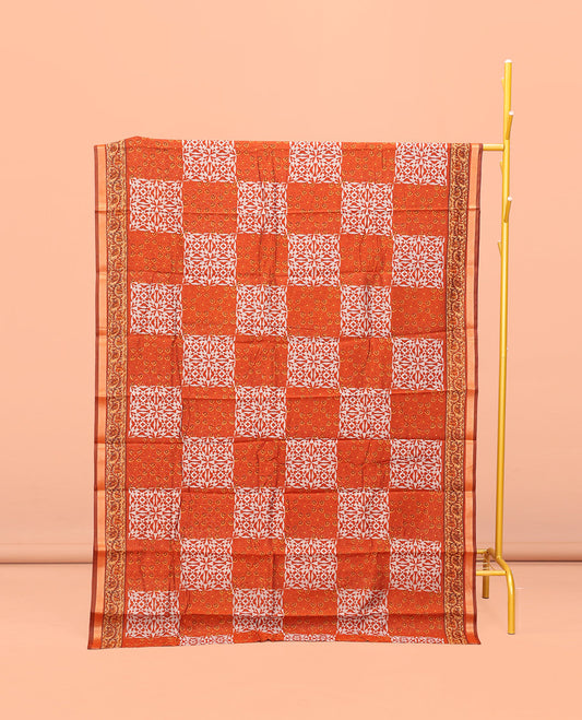 Orange Kanchi Cotton Saree, Adorned with Geometric Patterns Printed All Over Its Body, a Subtle Border, Pallu of Floral and Chakra Print, and Paired with a Matching Blouse