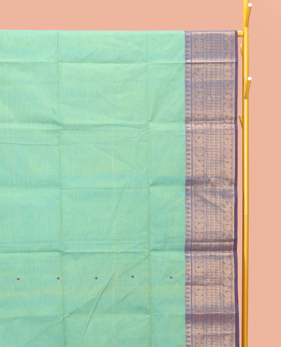 Light Turquoise Chettinad Cotton Saree, Decorated with Thread Buttas All Over Body, Complemented by a Contrast Traditional Zari Design Border, Pallu of Stripes and Buttas, and Paired with a Matching Blouse