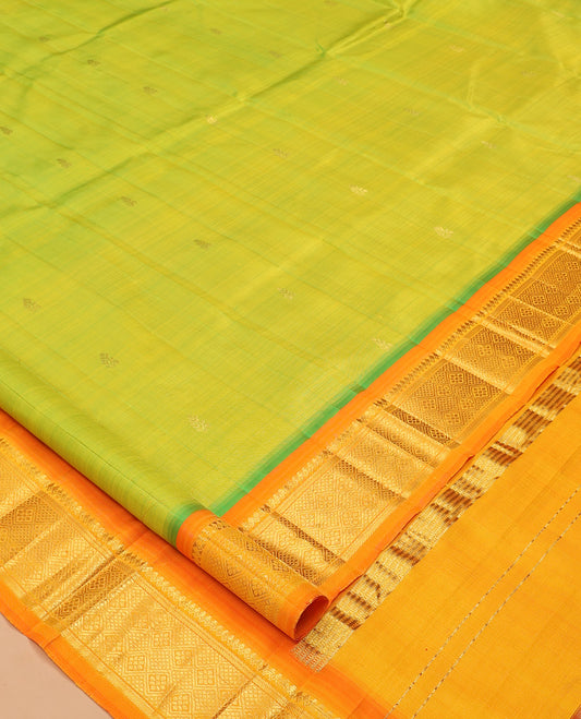 Green Kanchipuram Silk Saree, Graced with Zari Buttas, Complemented by a Contrast Border of Thilakam Mokku, and Jaal Design, Zari Design Pallu, and No Blouse