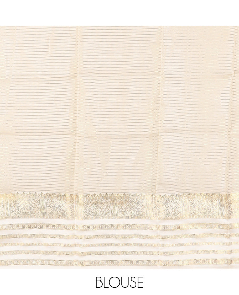 Orange Vasundhara Lite Silk Mix Saree accentuated with muthu kattam and zari buttas, complemented by contrast varisai pettu border of thilakam, muthu, and rudraksham designs, zari elevated pallu of jaal designs, and paired with a contrast blouse