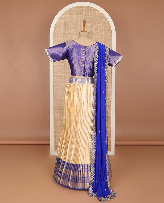 Cream half saree with contrast intricate zari design order, embroidered blouse & floral embroidery, scallop border dhavani