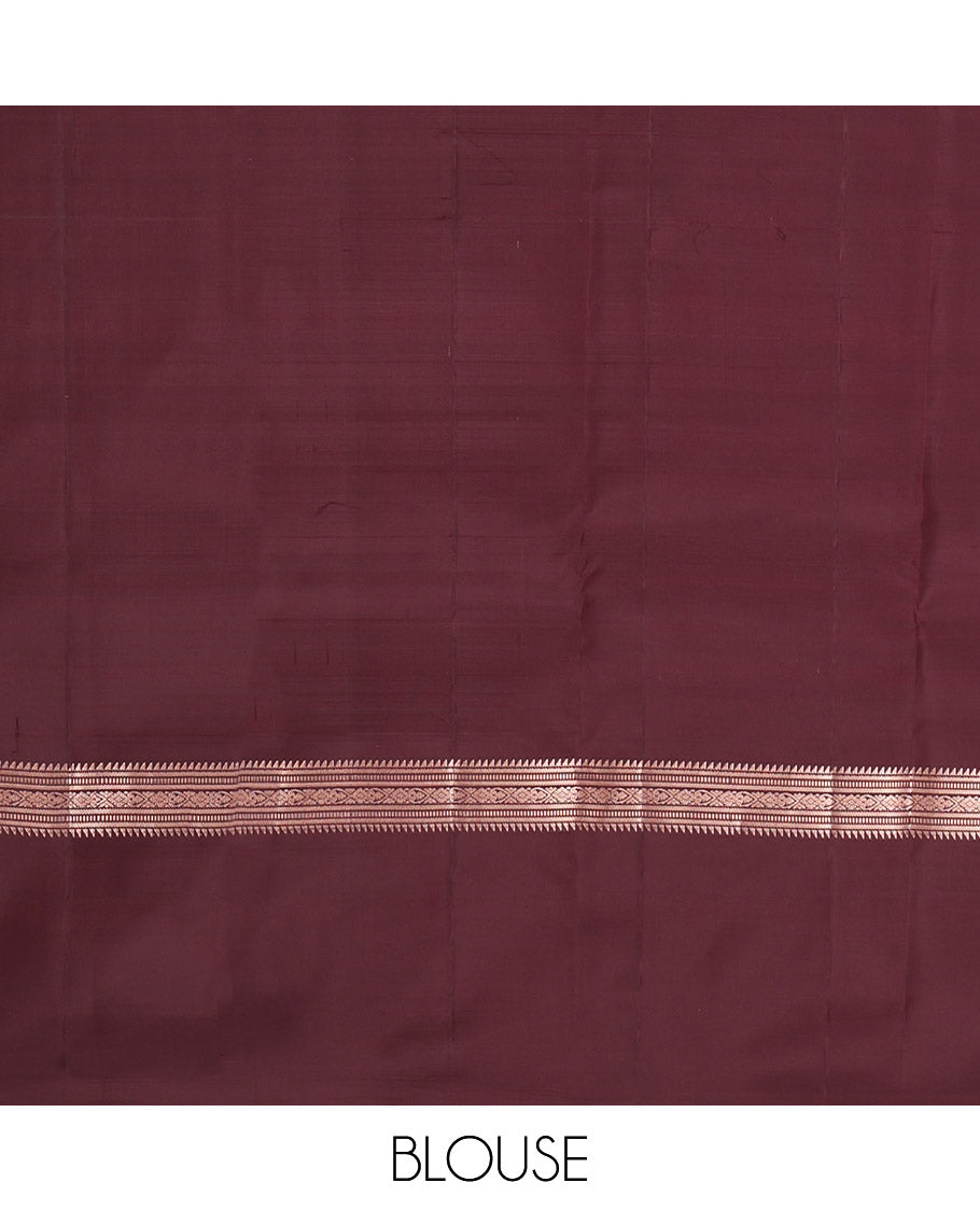 Brown Vasundhara Silk Saree, Artfully Detailed with Zari Buttas, Highlighted by a Zari Border of Rekku, Muthu, Jada Nagam, and Butta Enclosed Checks, Jaal Pallu, and a Matching Blouse
