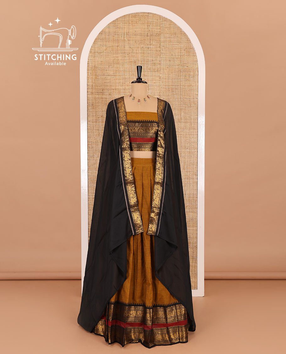Mustard-black sungudi cotton half-saree, plain with contrast traditional zari varisai pettu bordered skirt, a matching blouse, and a zari bordered dhavani