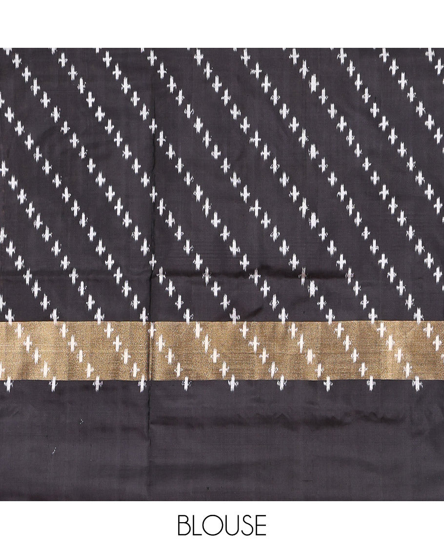 Pink Sparsely Striped Pochampally Ikat Saree, a Contrast Chevron Striped Border, Ikat-Style Pallu, and a Contrast Blouse