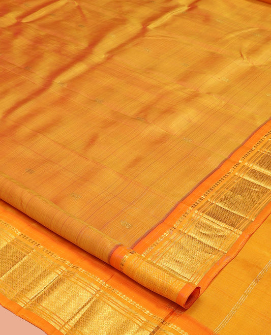 Orange Kanchipuram Silk Saree, Woven with Zari Buttas, a Contrast One-Sided Border of Panner Sombu, Banaras, Muthu, and Jaal Designs, a Zari Design Pallu, and No Blouse