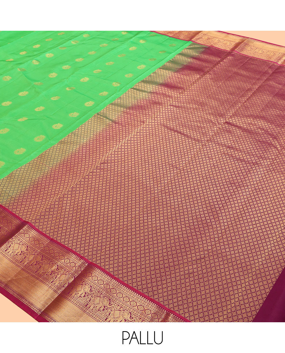 Green Vasundhara Lite Silk Mix Saree, Embellished with Zari Buttas, a Contrast Border of Banaras, Poun, Kamalam, Yaanai, and Mayil Kann Designs, Grand Pallu, and a Contrast Blouse