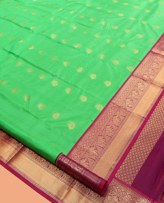 Green Vasundhara Lite Silk Mix Saree, Embellished with Zari Buttas, a Contrast Border of Banaras, Poun, Kamalam, Yaanai, and Mayil Kann Designs, Grand Pallu, and a Contrast Blouse