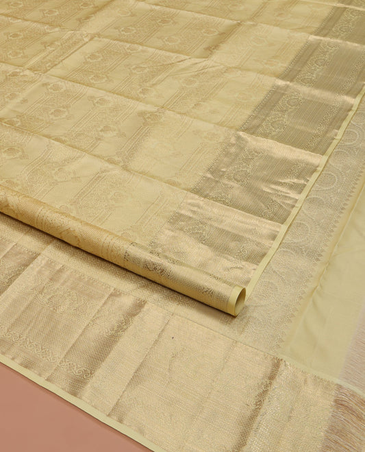 Yellow Kanchipuram Wedding Silk Saree, Opulently Embellished with Jacquard Design on Its Body, Highlighted by Zari Border of Traditional Designs, Mughal-Style Jaal Patterned Pallu, and Paired with a Matching Blouse