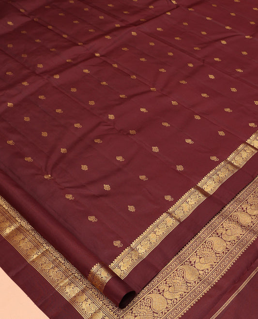 Maroon Vasundhara Silk Saree, Woven with Zari Buttas, a Zari Kaal Eragina Border of Rekku, Neli, Manga, and Mayil Designs, Grand Pallu, and a Matching Blouse