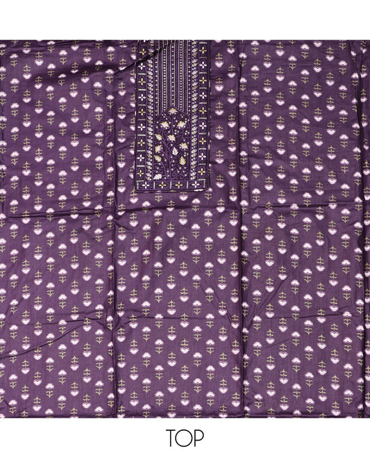 Purple Cotton Material Chudidar Set, Adorned with Floral Motifs Block Print, and Neck Embroidery on Its Cotton Top, a Floral Printed Bottom, and Paired with Chevron Printed Cotton Dupatta