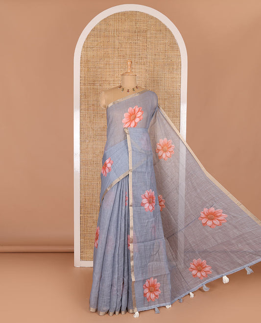 Grey daisy floral printed linen cotton saree, gold zari piping border, daisy floral printed pallu, and matching  floral printed blouse