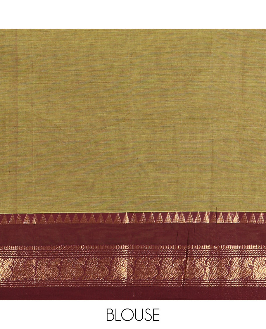 Leaf Green Plain Chettinad Cotton Saree, Complemented by Contrast Rettai Pettu Traditional Zari Border of Temple and Peacock Designs, Striped Pallu, and Paired with a Matching Blouse