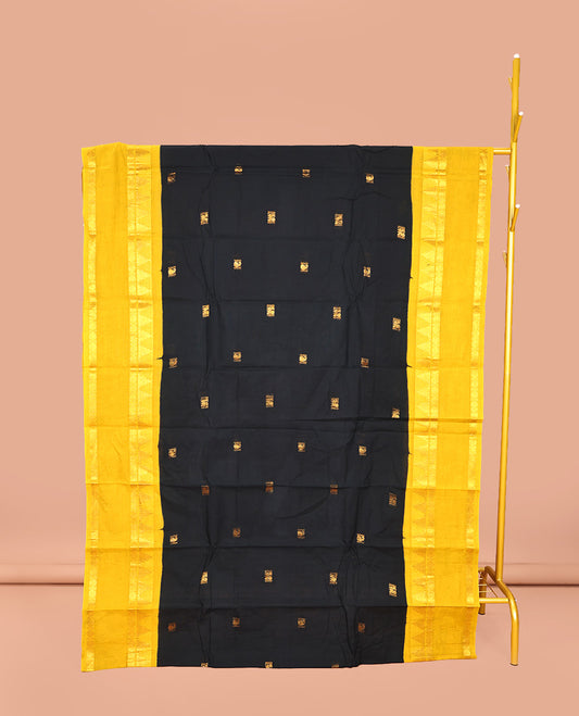 Black Sungudi Cotton Saree, Prettified with Zari Buttas on Its Body, Complemented by a Contrast Retttai Pettu Traditional Zari Design Border, Zari-Design Pallu, and Paired with a Contrast Blouse