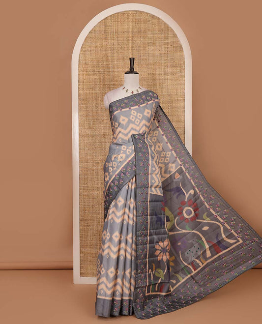 Grey pochampally ikkat style geometric printed fancy tussar saree, contrast floral motifs thread embroidered border, ikkat printed pallu, and plain blouse