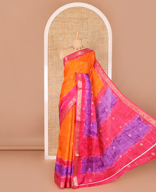 Orange buttas enclosed checked dola silk saree, contrast shibori print with traditional zari border, buttas enclosed checked pallu, and a contrast buttas enclosed checked blouse