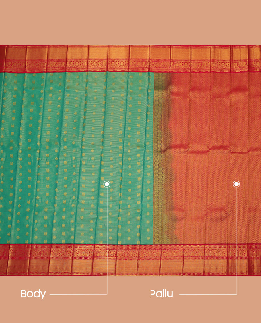 Green Budget Silk Saree, Gleamed Up with Peacock-Chakram Buttas, a Contrast Traditional Zari Border, Grand Pallu, and a Contrast Blouse