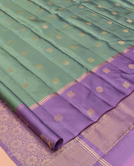 Green Vasundhara Lite Silk Mix Saree, Adorned with Mayil-Chakram Buttas, a Contrast Mayil-Chakram Zari Border, Grand Pallu, and a Contrast Blouse
