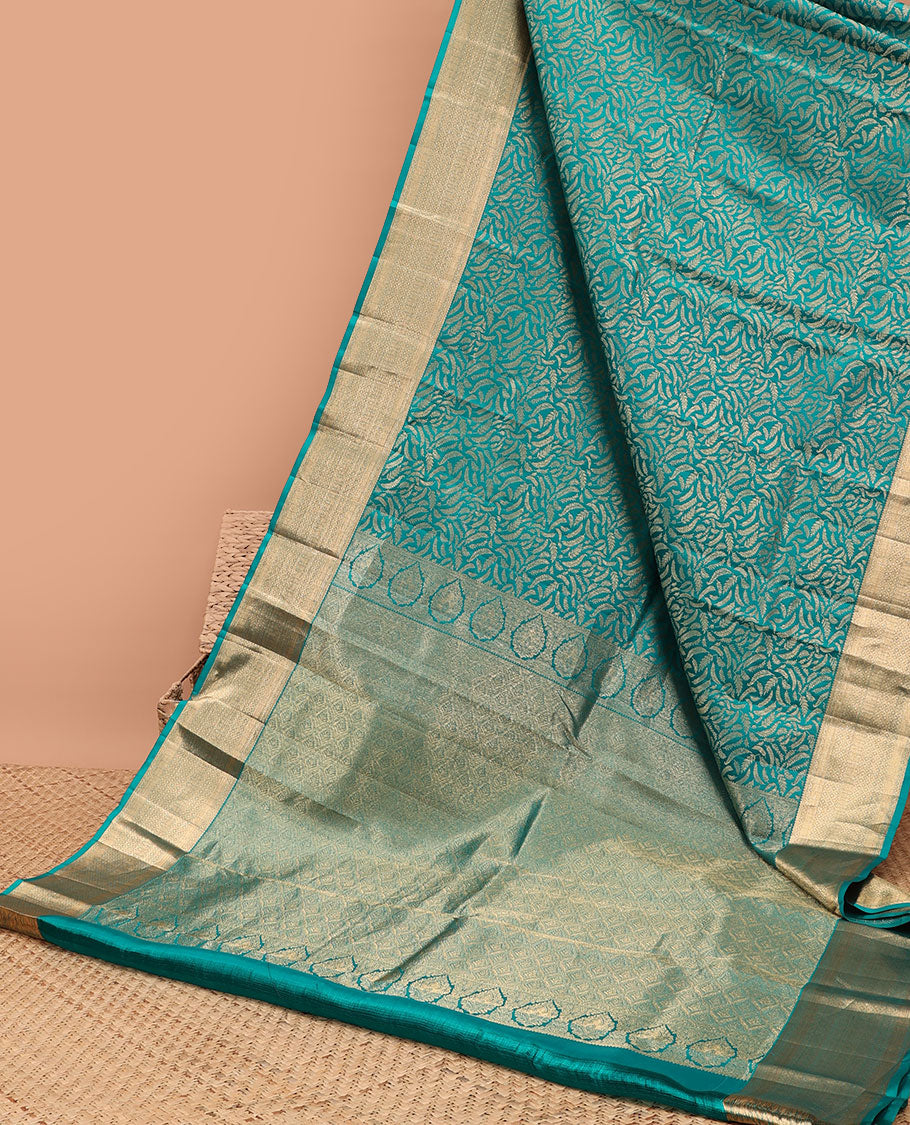 Green leaf design kancheepuram silk saree with self border of zari design & argyle pattern pallu