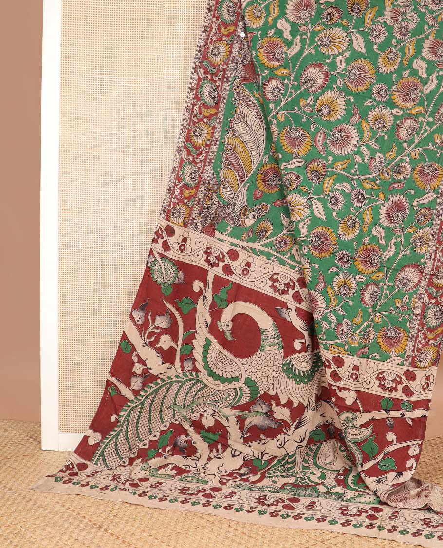 Green floral vine, and peacock machine printed kalamkari cotton saree, contrast peacock creeper border, and pallu of peacock print