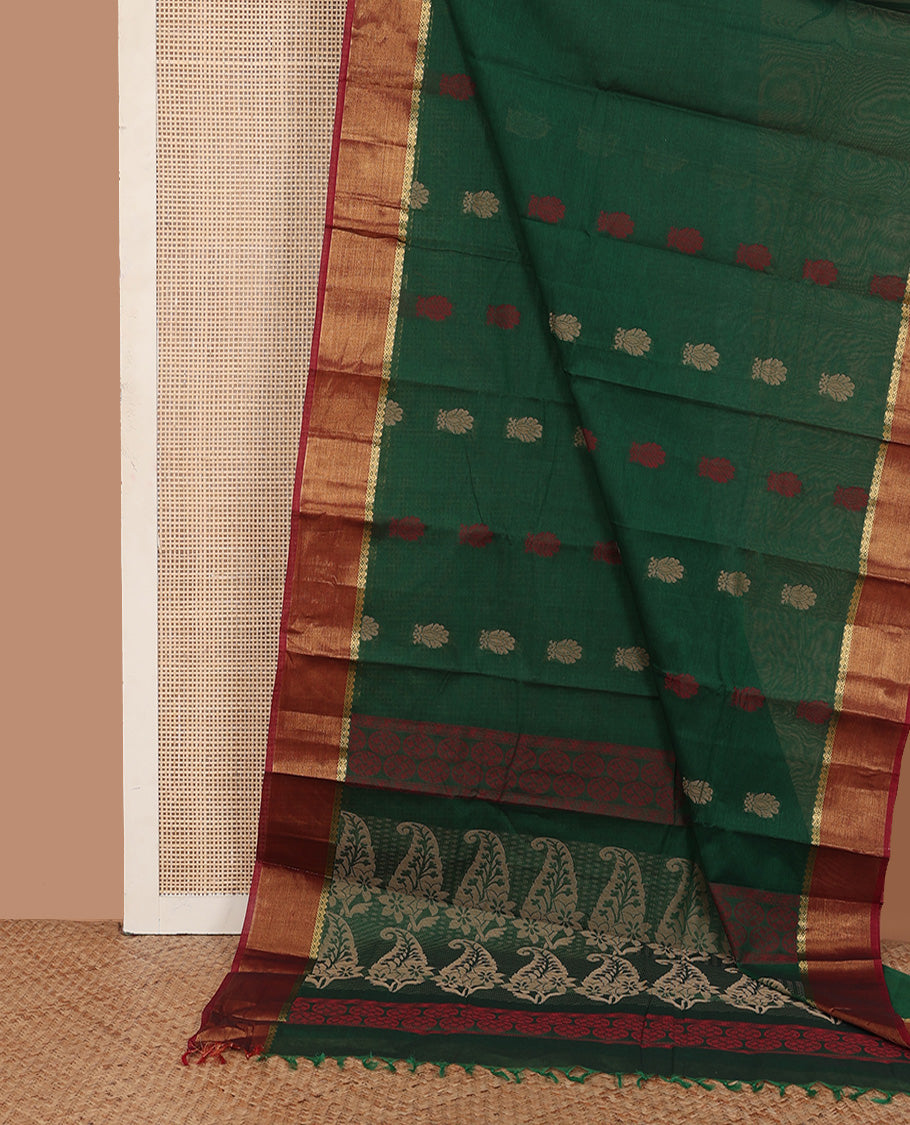 Dark green butats Kanchi cotton saree, contrast zari border, and paisley motif pallu