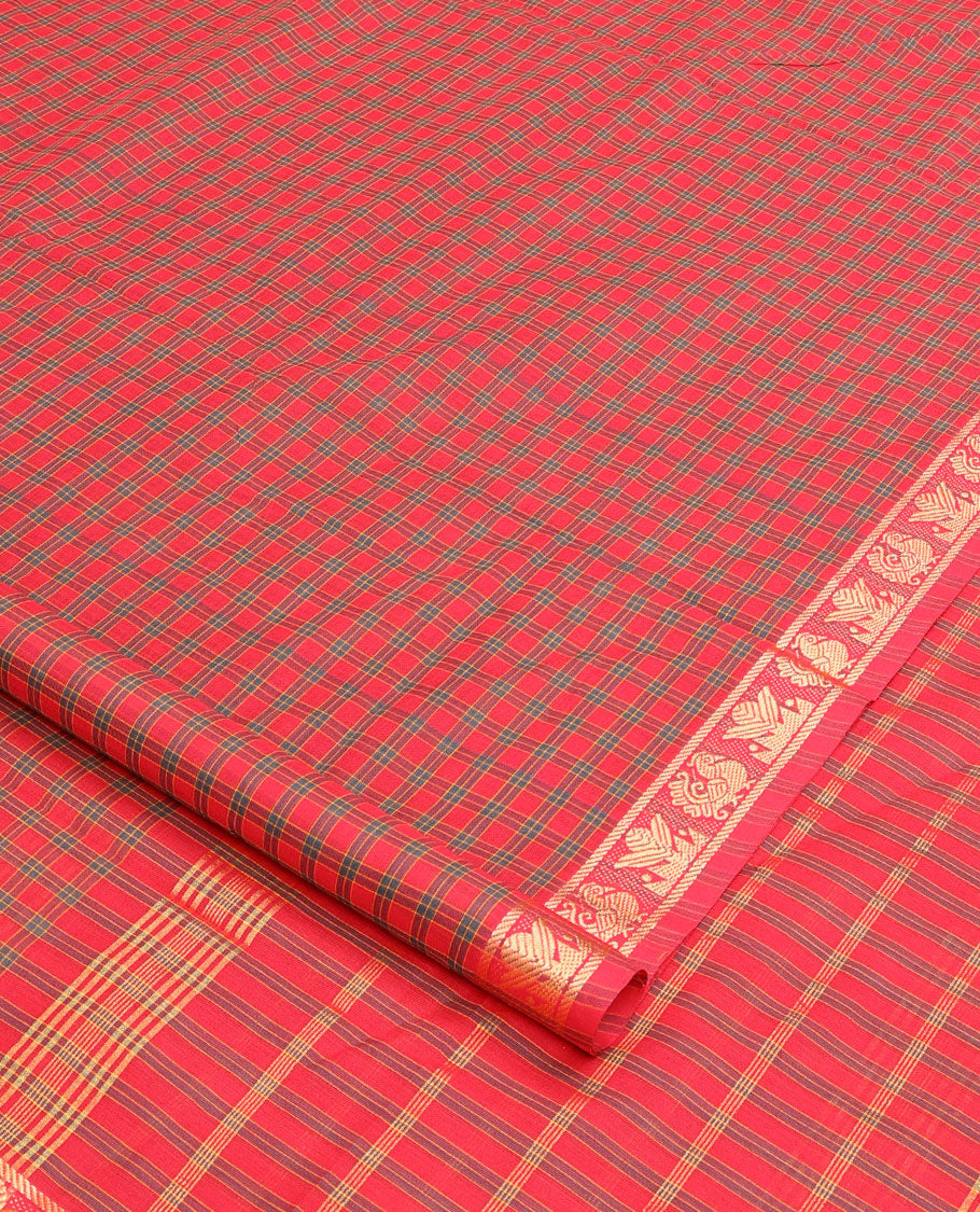 Pink checked nine-yard cotton saree, traditional motifs border, and pallu of stripes