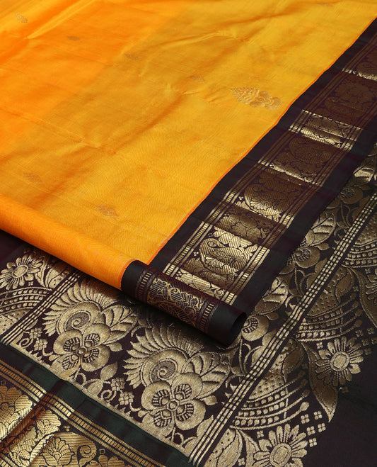 Yellow zari buttas Kanchipuram silk saree, contrast korvai one-sided border of banaras,muthu,manga & kodi visiry & floral design pallu