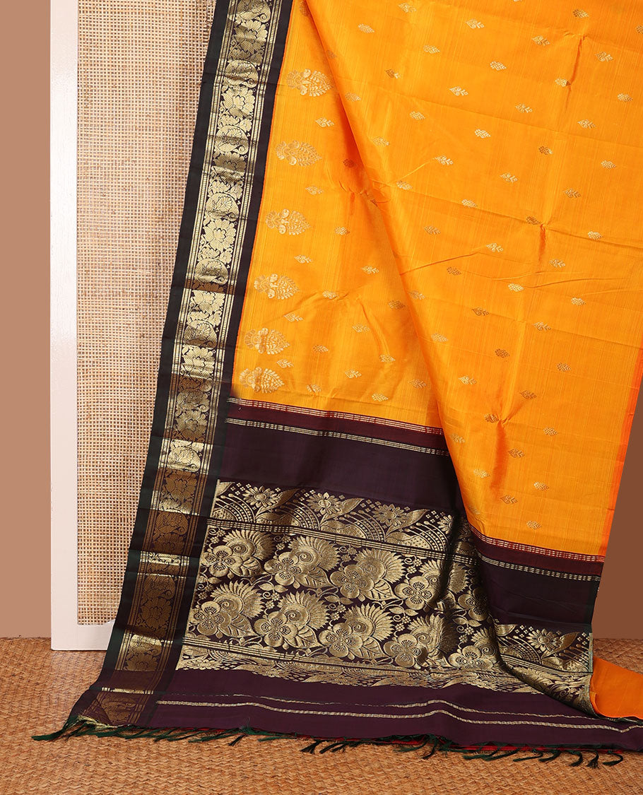Yellow zari buttas Kanchipuram silk saree, contrast korvai one-sided border of banaras,muthu,manga & kodi visiry & floral design pallu