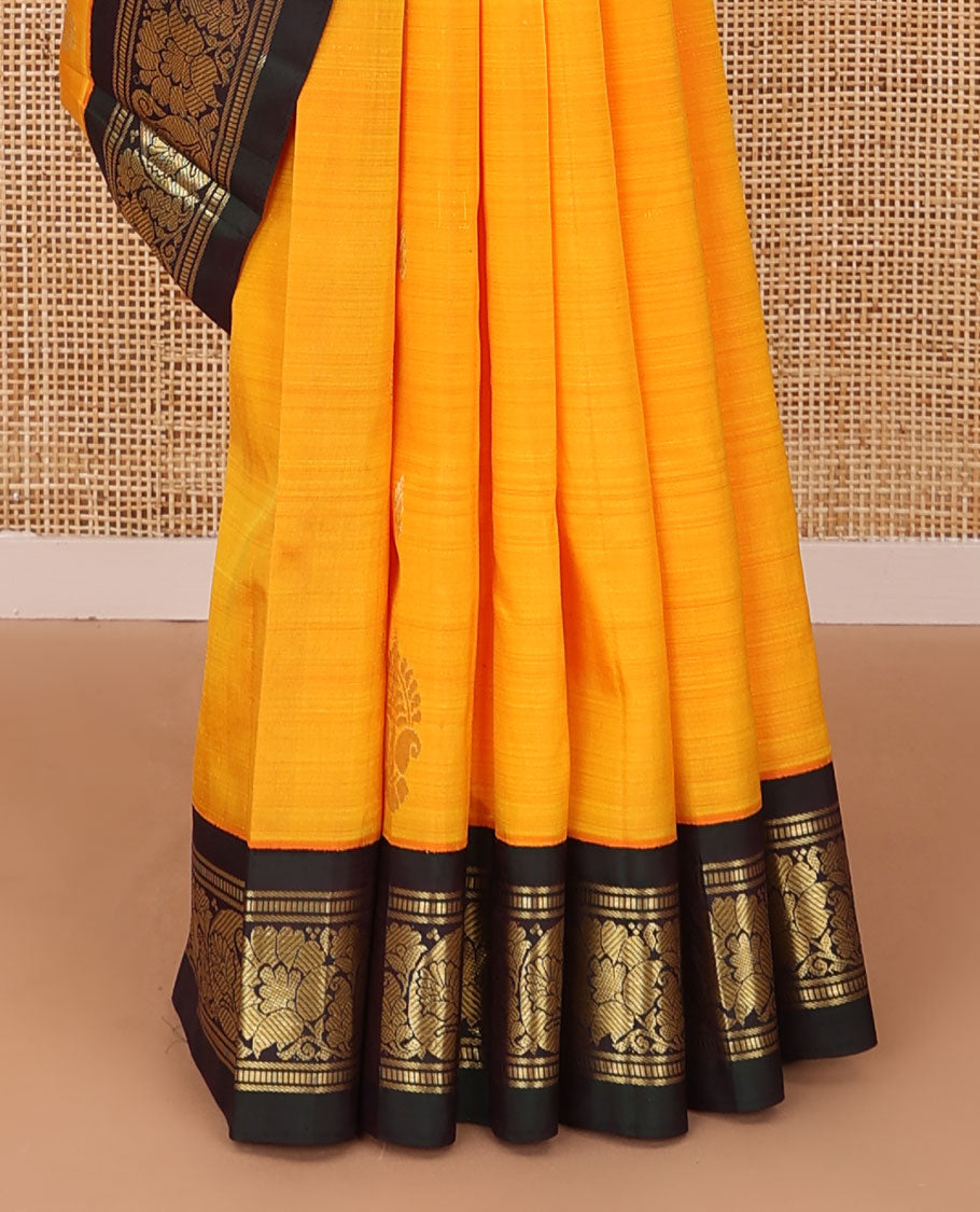 Yellow zari buttas Kanchipuram silk saree, contrast korvai one-sided border of banaras,muthu,manga & kodi visiry & floral design pallu