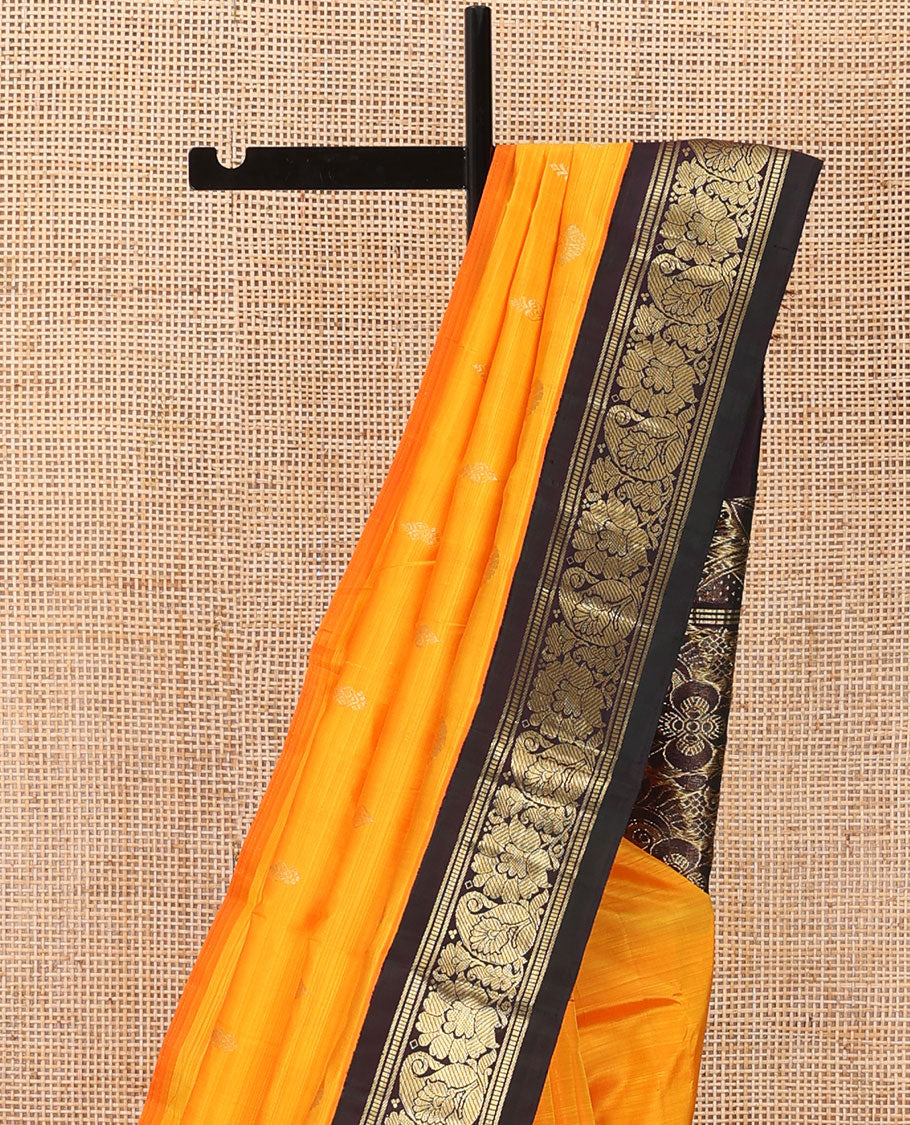 Yellow zari buttas Kanchipuram silk saree, contrast korvai one-sided border of banaras,muthu,manga & kodi visiry & floral design pallu