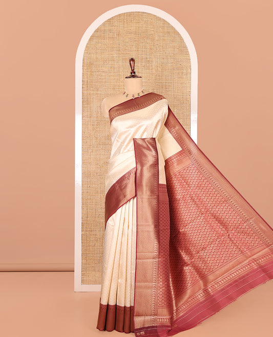 Cream-Maroon Embossed Art Kanchi Silk Saree, a Contrast Traditional Zari Border, Intricate Pallu, and a Contrast Blouse