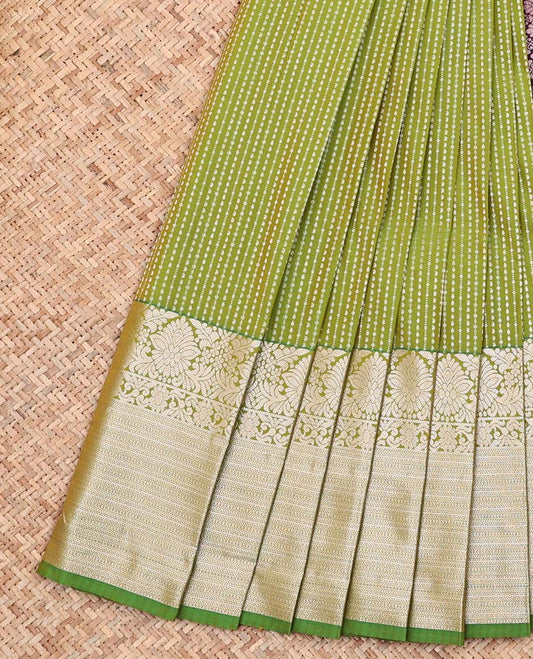 Green Budget Silk Saree, Entralled with Zari Stripes On Its Body, Highlighted by Traditional Zari Designs Woven Border, Grandly Decked Up Pallu and Paired with a Contrast Blouse