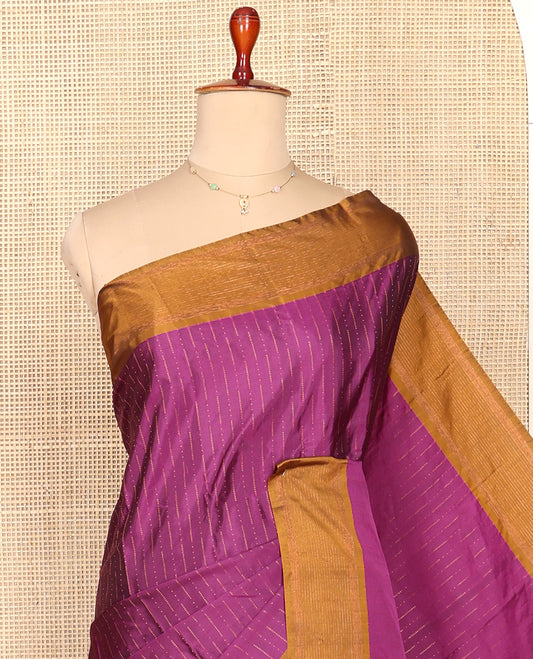 Purple Aarani Silk Saree, Elevated with Zari Stripes All Over Its Body, Complemented by a Contrast Zari Stripes Border, Pallu of Stripes, and Paired with a Matching Blouse