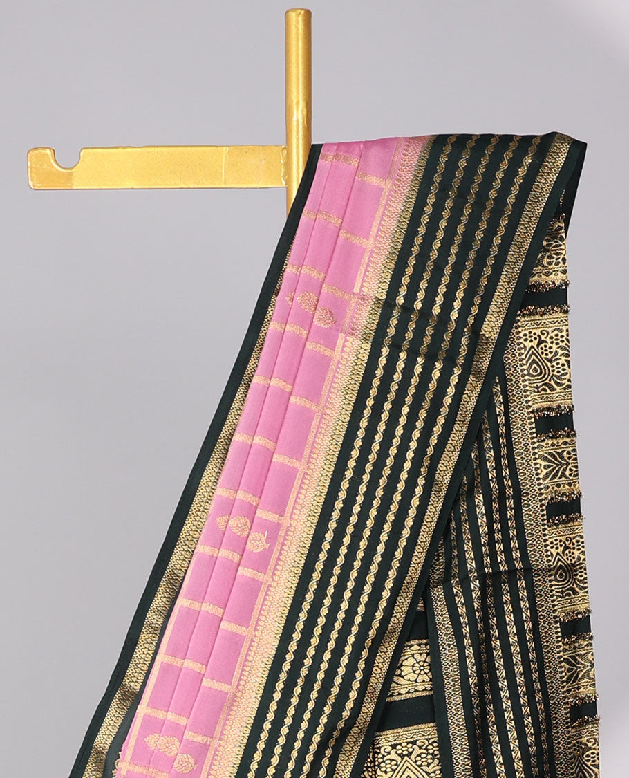 Pink floral motifs enclosed checked with contrast striped zari border & pallu of intricate design