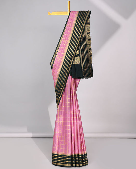 Pink floral motifs enclosed checked with contrast striped zari border & pallu of intricate design