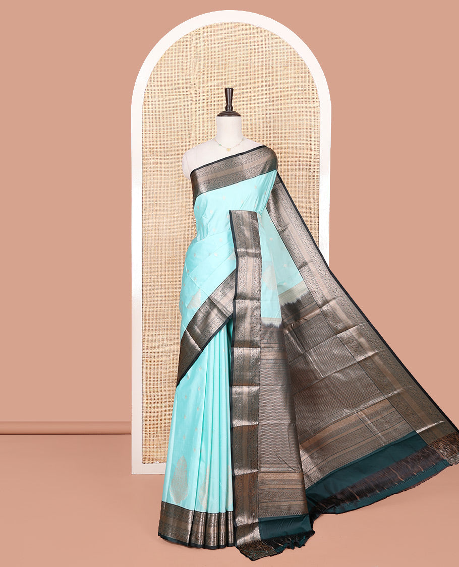 Blue Budget Silk Saree, Sparsely Woven with Zari Buttas All Over Its Body, Complemented by a Contrast Traditional Zari Design Border, Jaal Design Pallu, and Paired with a Contrast Blouse